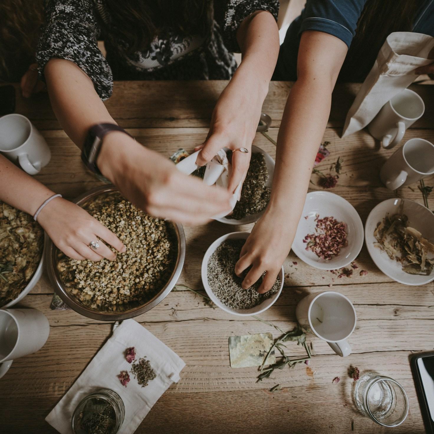 Community members collaborating in a modern kitchen space, sharing recipes and techniques